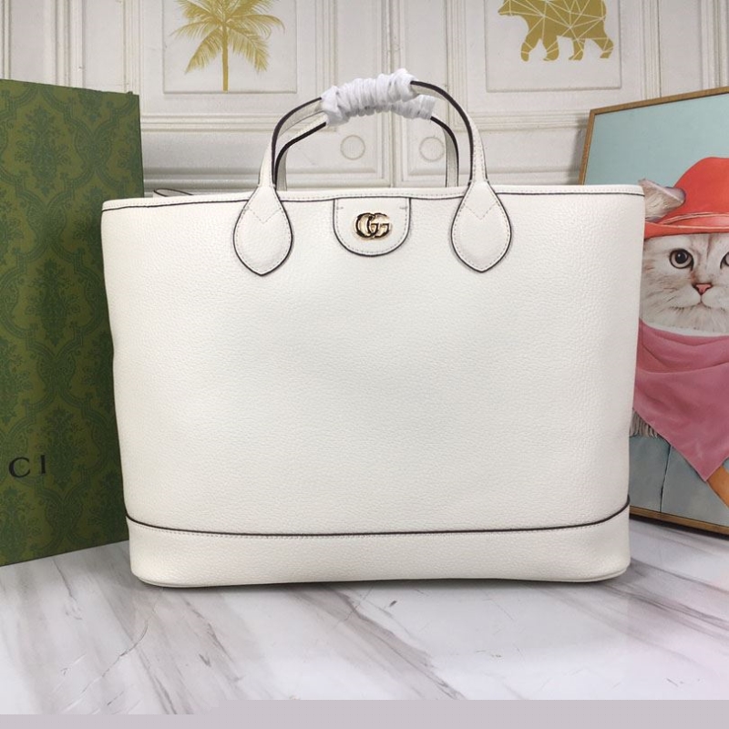 G*u*i shopping bags